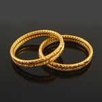 Load image into Gallery viewer, Set OF 4 Gold-Plated Gold-Toned Cutwork Bangle