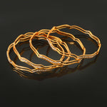 Load image into Gallery viewer, Set Of 4 Gold-Plated AD-Studded Bangles