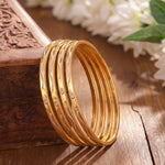 Load image into Gallery viewer, Women Gold-Toned Textured Bangles Set of 4
