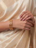 Load image into Gallery viewer, Women Gold-Toned Textured Bangles Set of 4