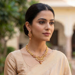 Load image into Gallery viewer, Premium Gold-Plated Ethnic Choker Set with Intricate Floral Motif and Stone Droplets