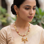 Load image into Gallery viewer, Antique matte gold-plated choker with floral pendant and pastel enamel detailing