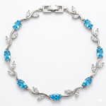 Load image into Gallery viewer, 18k Gold Plated Floral Vine Tulip Bracelet with Aquamarine Blue & White Crystals