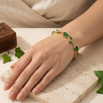 Load image into Gallery viewer, Gold-Toned Emerald Green Stone & Leaf Floral Tulip Bracelet