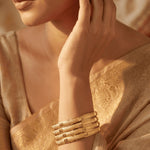 Load image into Gallery viewer, Set Of 4 Gold-Plated Cut Work Plane Design Bangles
