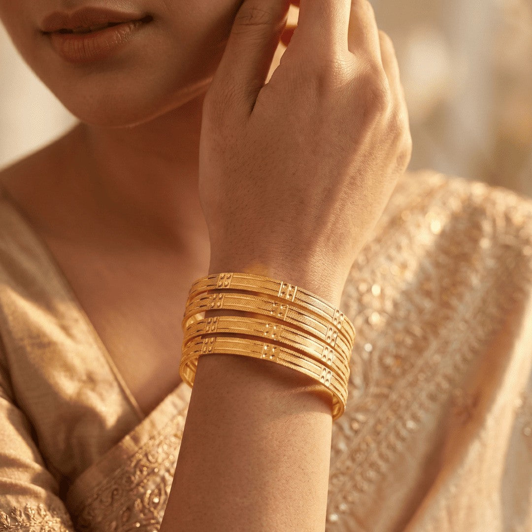 Set Of 4 Gold Plated Cutwork Bangles
