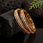 Load image into Gallery viewer, Set of 2 Gold-Toned &amp; American Diamond  Stone-Studded Contemporary Open-Work Bangles
