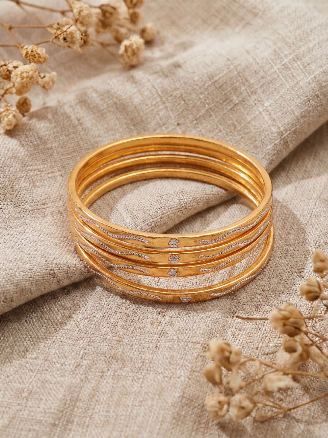 Women Gold-Toned Textured Bangles Set of 4