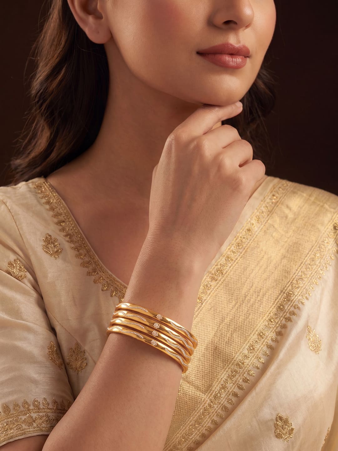 Women Gold-Toned Textured Bangles Set of 4