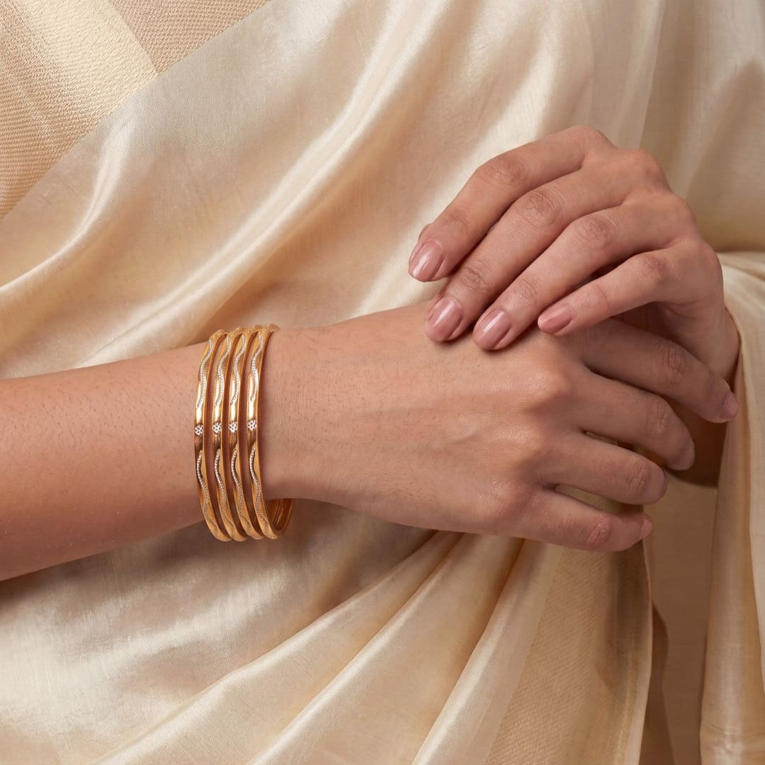 Women Gold-Toned Textured Bangles Set of 4