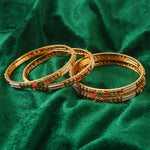 Load image into Gallery viewer, Set Of 4 Gold-Plated Stone-Studded &amp; Pearl Beaded Bangles
