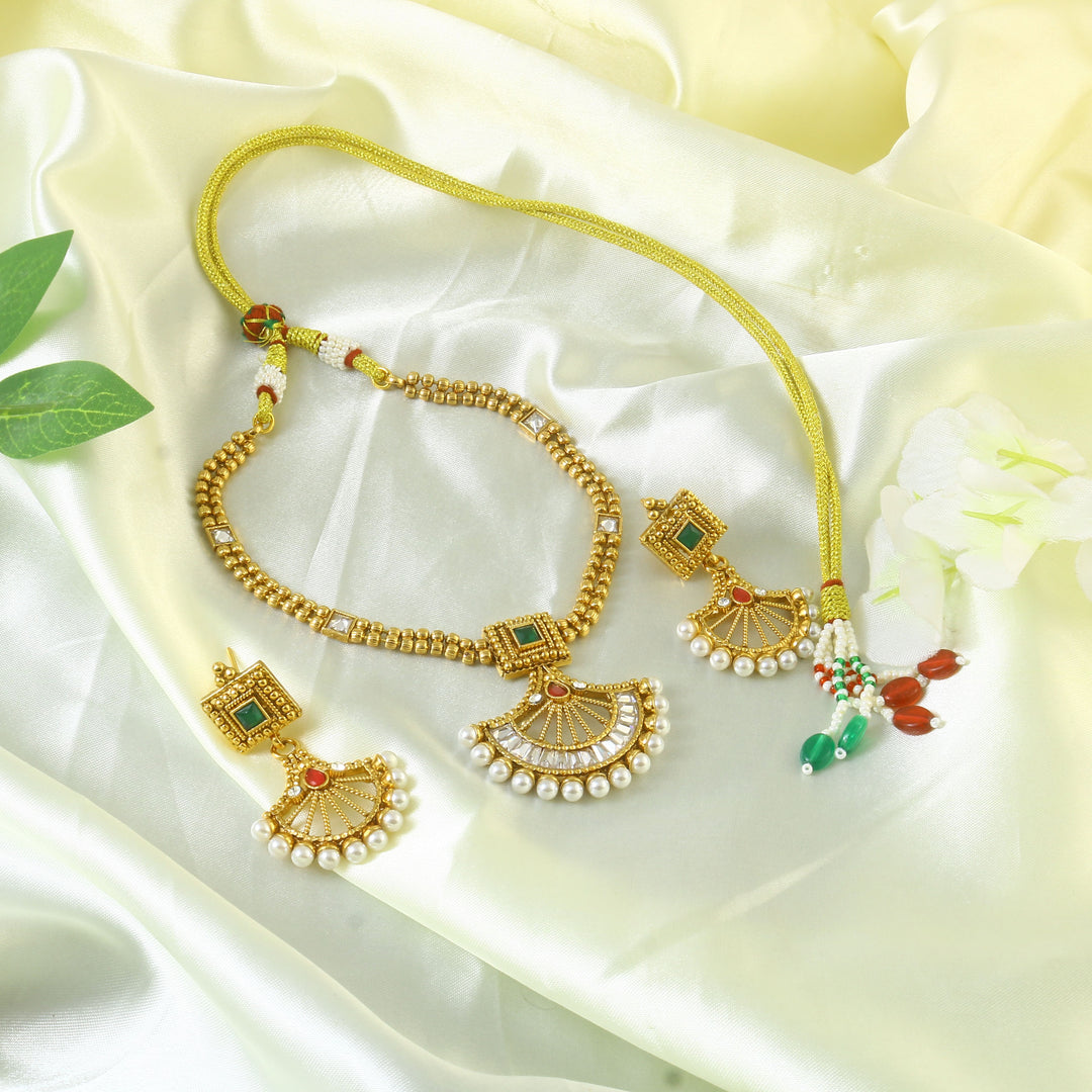 Gold Plated Ruby Red,Emrald and Pearl Studded Gold Beaded Handcrafted Jewellery Set