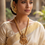 Load image into Gallery viewer, Antique Matte Gold Finish Traditional Temple Jewelry Goddess Lakshmi Pendant Necklace Set
