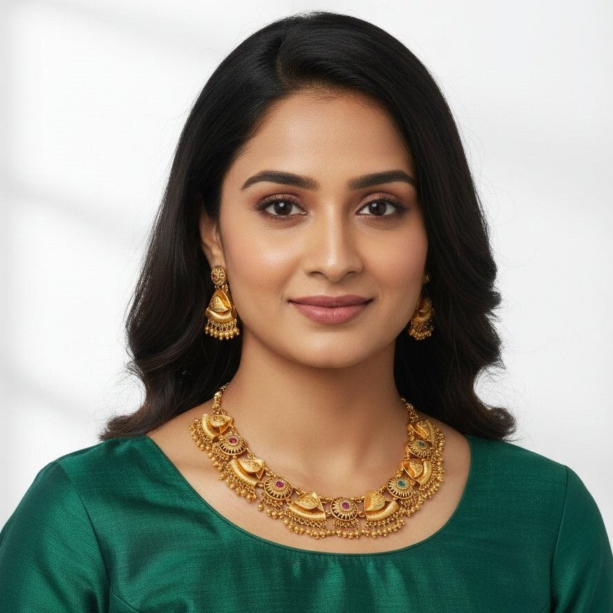 Women Gold-Plated Ruby Red and Emrald Dark Green Stone-Studded Traditional Jewellery Set
